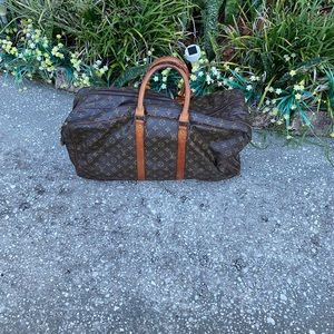 LV leather, monogrammed, large carry on